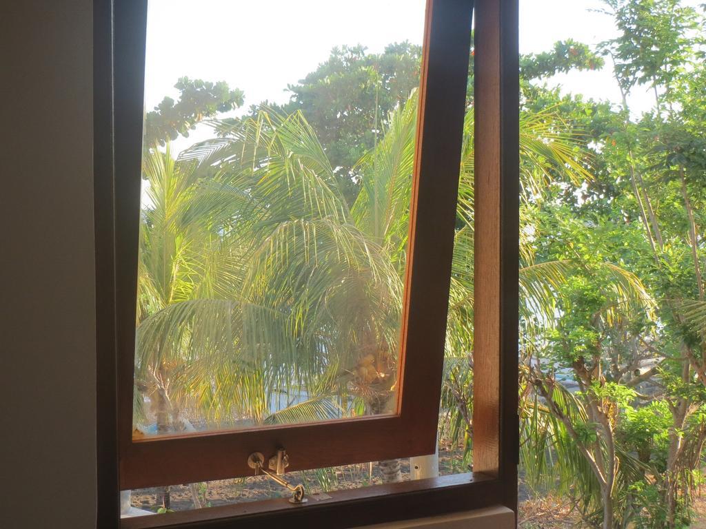Amed Sari Beach Guesthouse Экстерьер фото