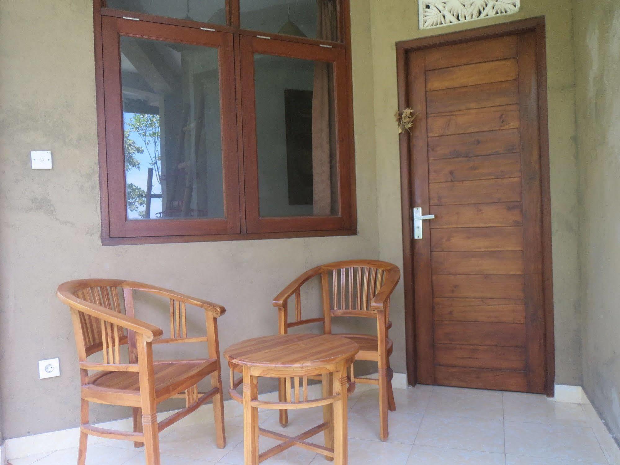 Amed Sari Beach Guesthouse Экстерьер фото